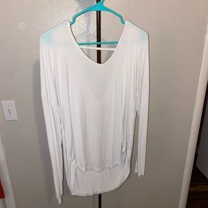 White v-neck blouse with cut out back